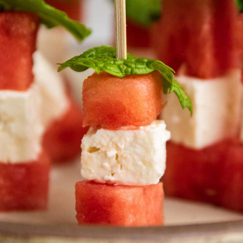 Mint watermelon and feta cheese on a skewer.