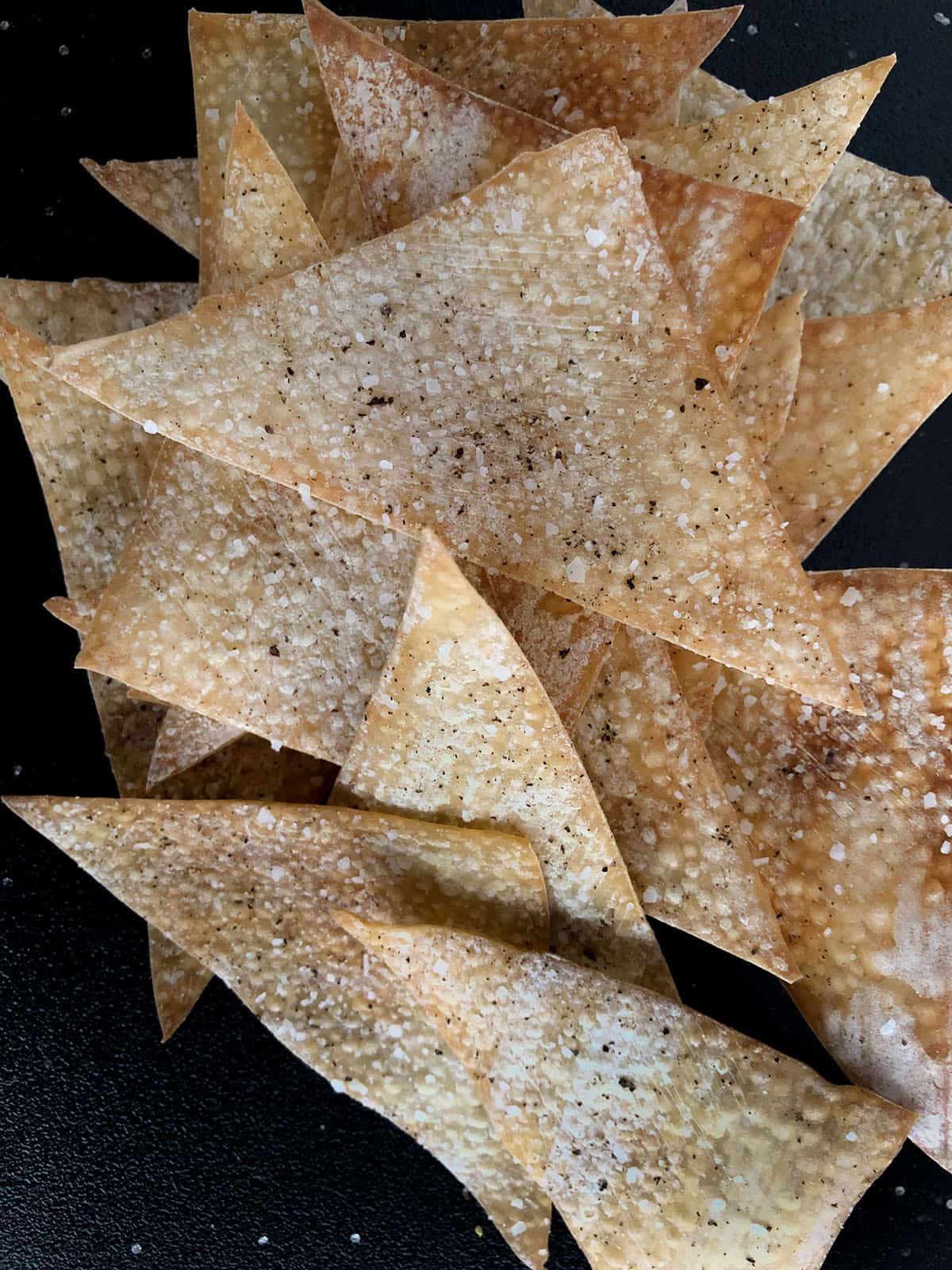 Wonton chips with salt and pepper.