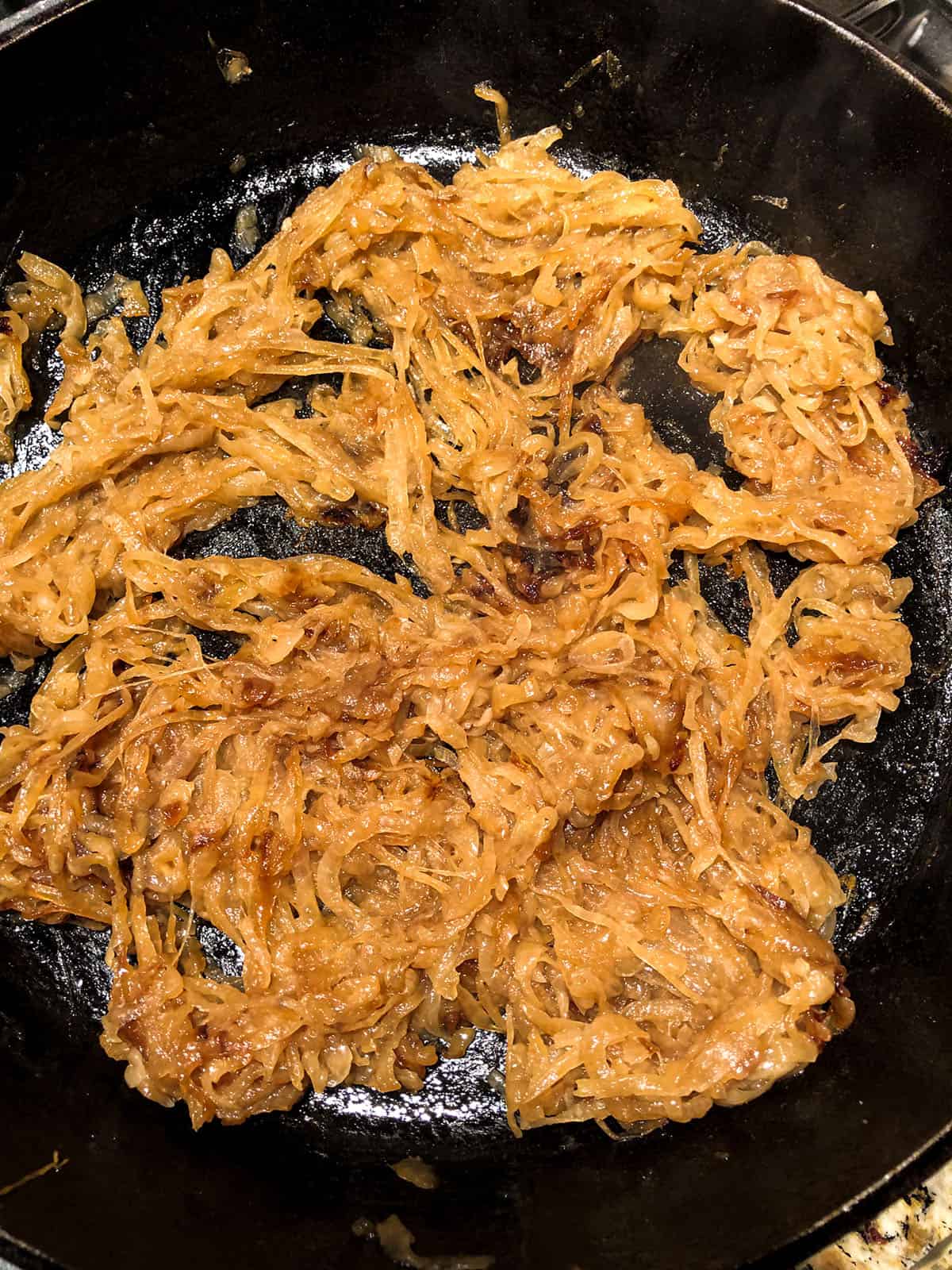 Onions caramelized in cast iron skillet.