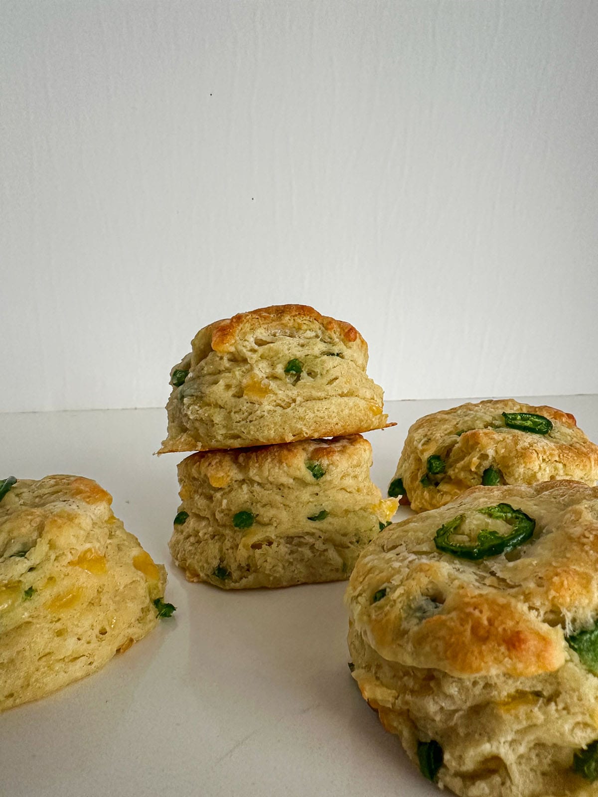 Jalapeño cheese biscuits on a board.