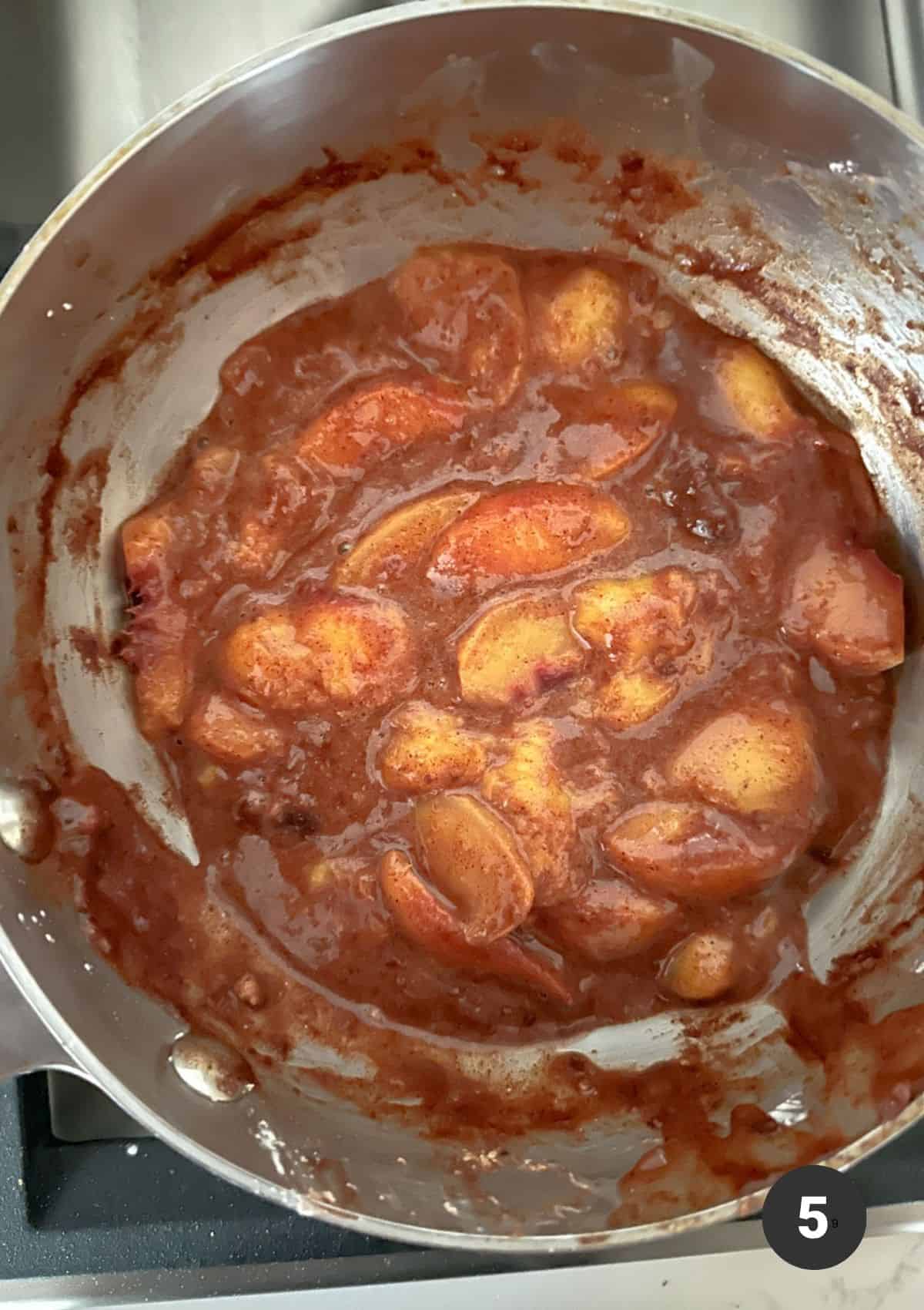 Cooked peaches for coffee cake.