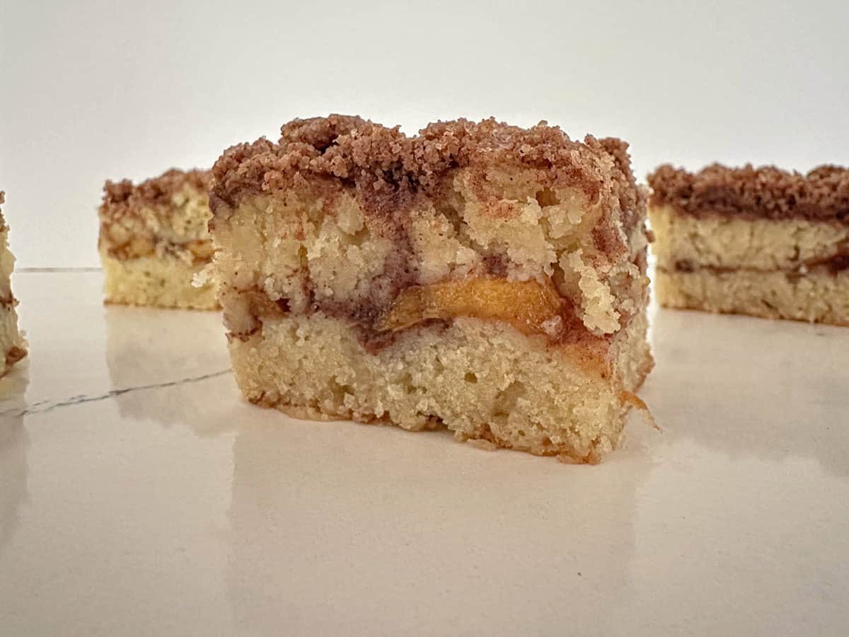 Pieces of peach coffee cake.