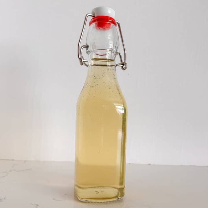 A bottle of mint simple syrup.